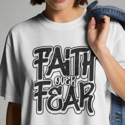 <p>Faith over fear tee in white, featuring bold black typography, perfect for showcasing resilience and positivity.</p>